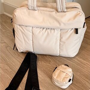 Calpak Luka Duffel in Oatmeal with Backpack Zip Bag Charm